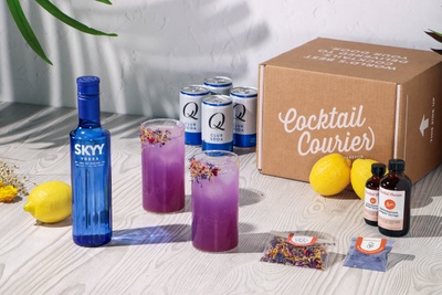 Electric Skyy Mule Cocktail Kit with Skyy Vodka, ginger lemongrass syrup, butterfly pea power, club soda, fresh lemon, and flower petal rim.