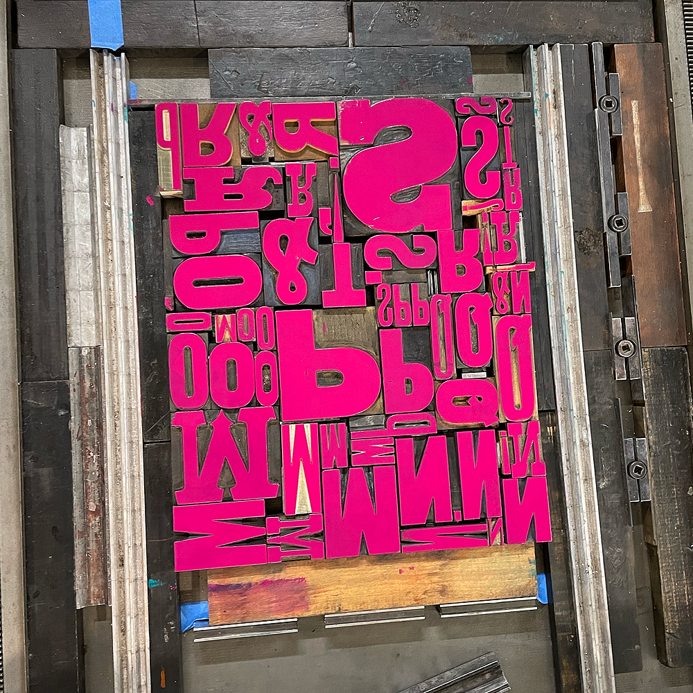 Inked up wood type ready for printing