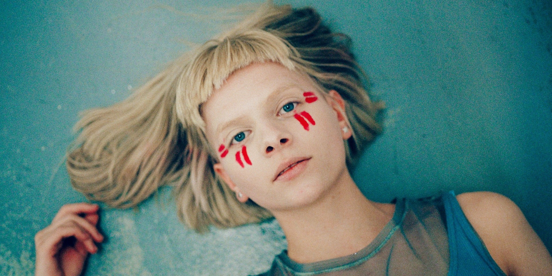 "It's about believing in all the tiny people who are actually very big": An interview with AURORA