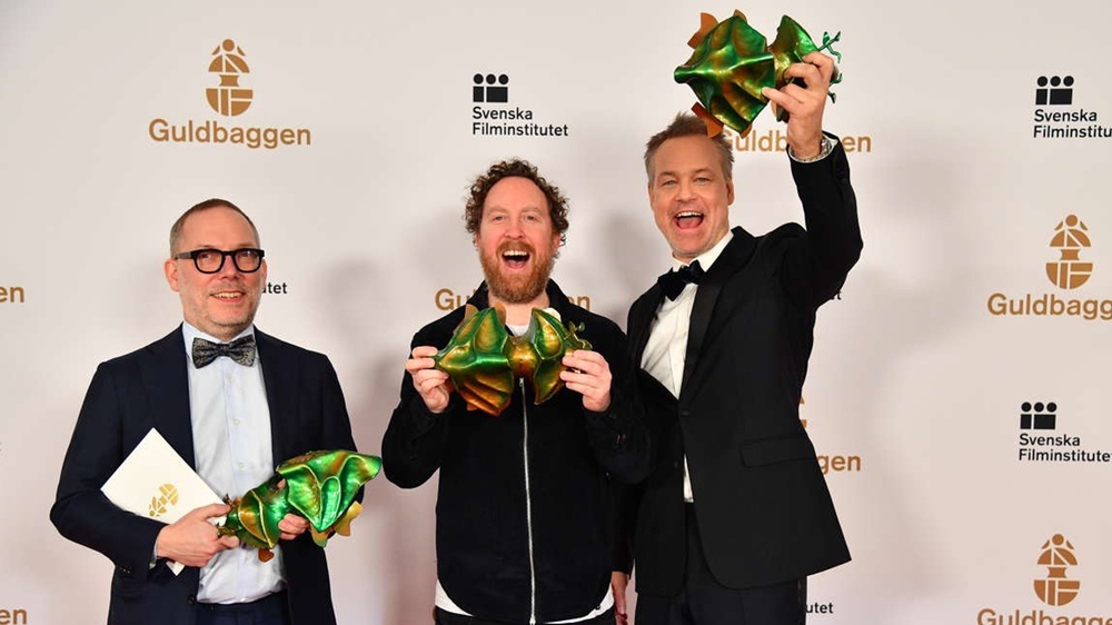 Producer Tomas Michaelsson, actor/screenwriter Uje Brandelius and director Henrik Schyffert picked up three Guldbagge Awards for Run Uje Run. Photo: Pelle T Nilsson /Swedish Press Agency