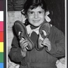AIU Girls School, Student Receives Shoes from the JDC (Tunis, Tunisia, c1954)
