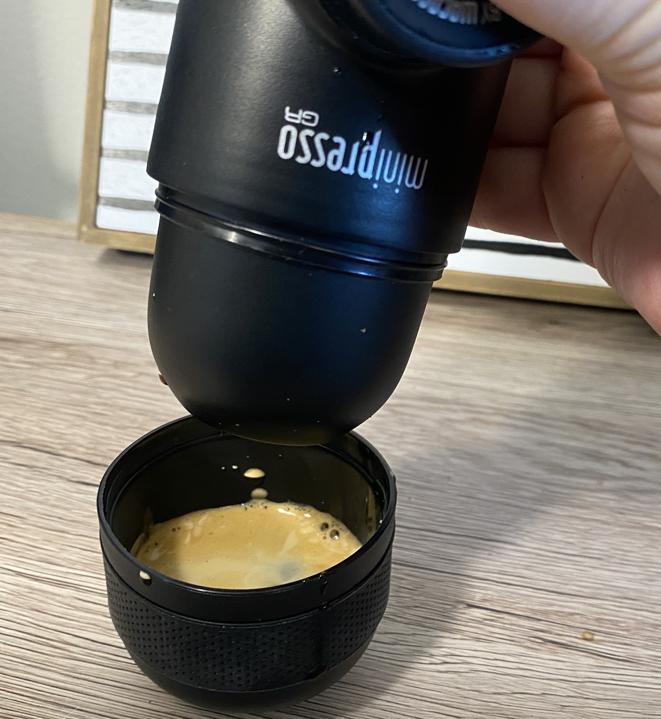 The Minipresso GR includes a built-in espresso cup