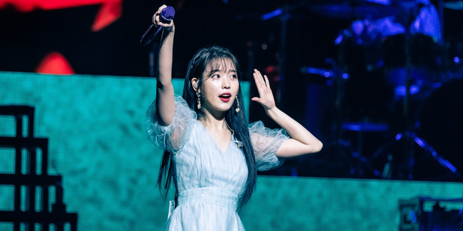 IU displays a special connection with fans at Singapore show – gig report