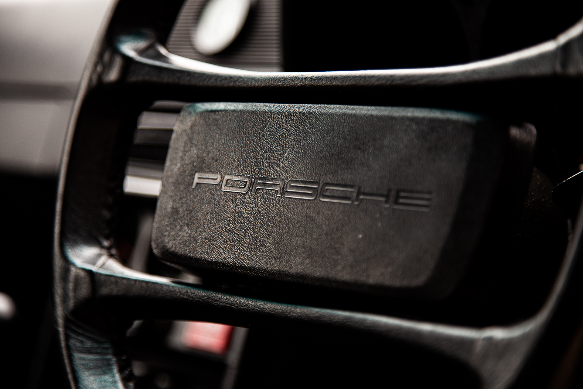 Porsche black leather steering wheel