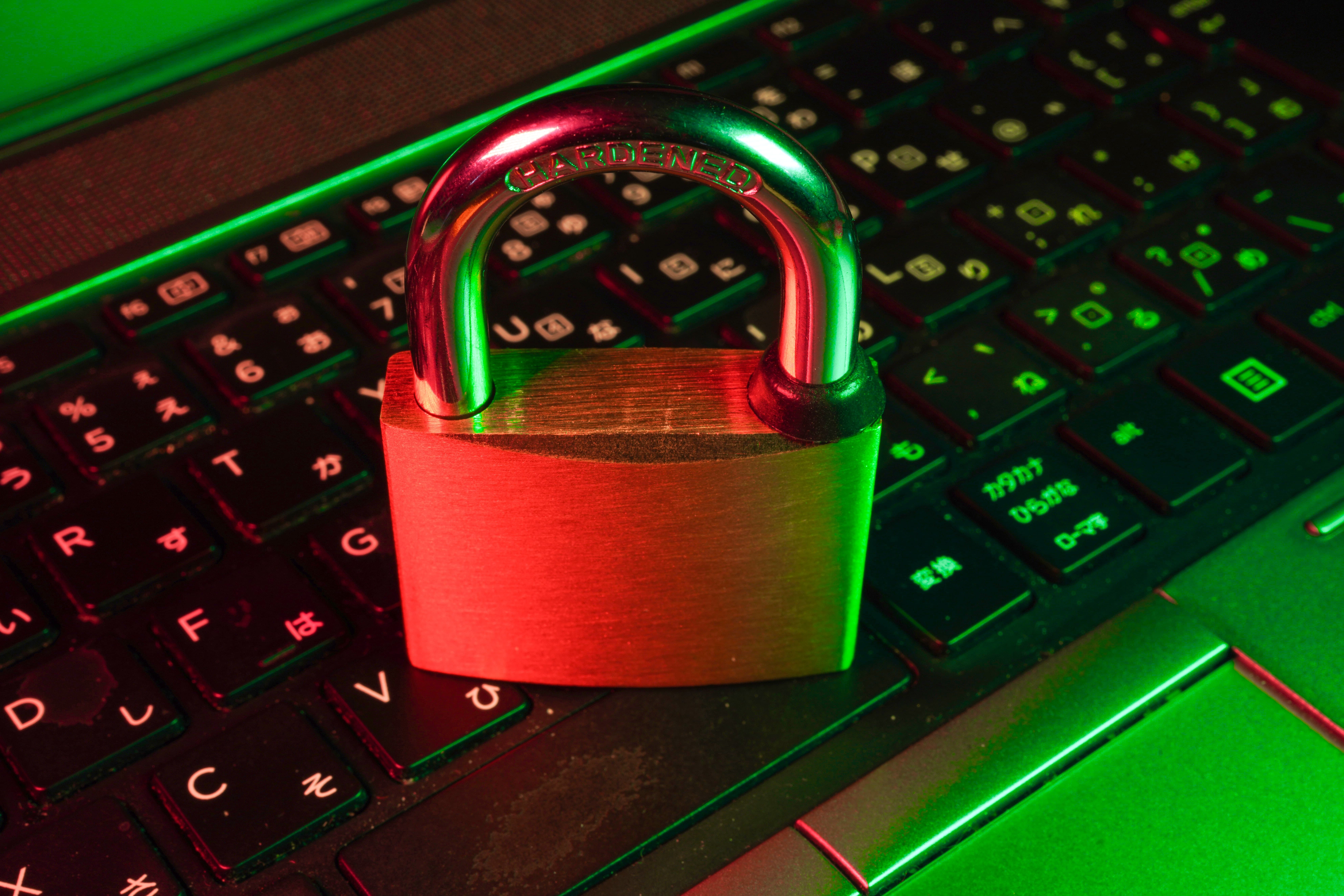 lock on keyboard representing cyber security