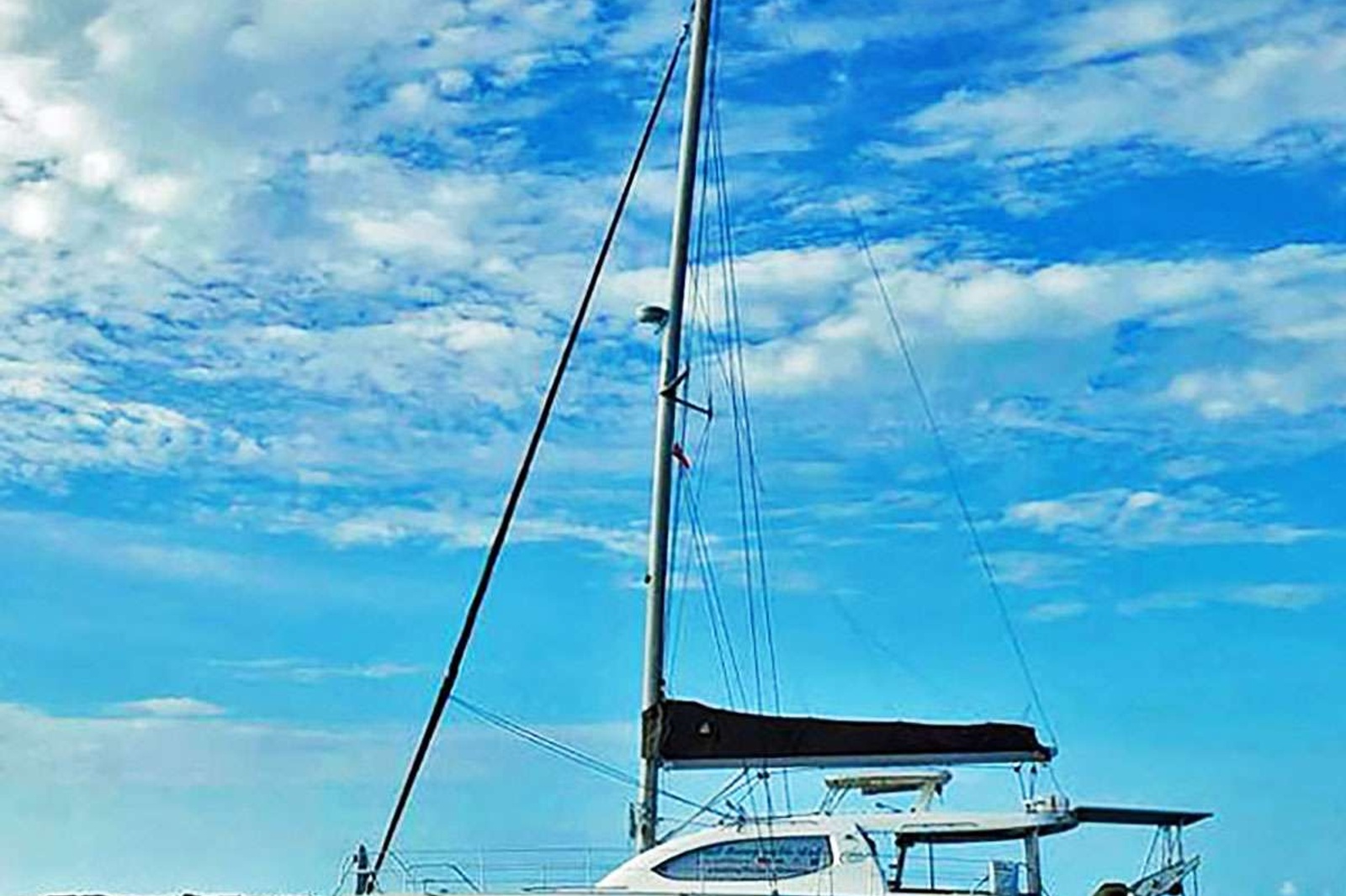 Getaway to Ft. Lauderdale, the Florida Keys, The Bahamas, or anywhere in between, on this lovely Leopard 46', The Space Between.  An ideal size for a family or couples, this sailing catamaran sleeps up to 6 passengers in 3 Queen, En-suite cabins. Each cabin is equipped with full shower, head, and great storage cupboards.

The deck space and living areas also create plenty of areas to lounge, dine, and take in the scenery. The unique cockpit table with map of the cruising region is always fun to check out as your journey to these beautiful destinations.