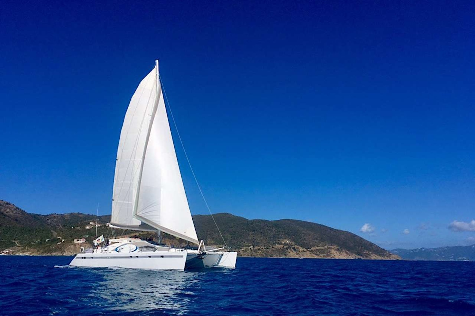 Catamaran KELEA, a 60 ft Privilege accommodating up to 10 guests in cruising comfort, with a master king guest suite, and 4 equal queen-berth guest suites.
