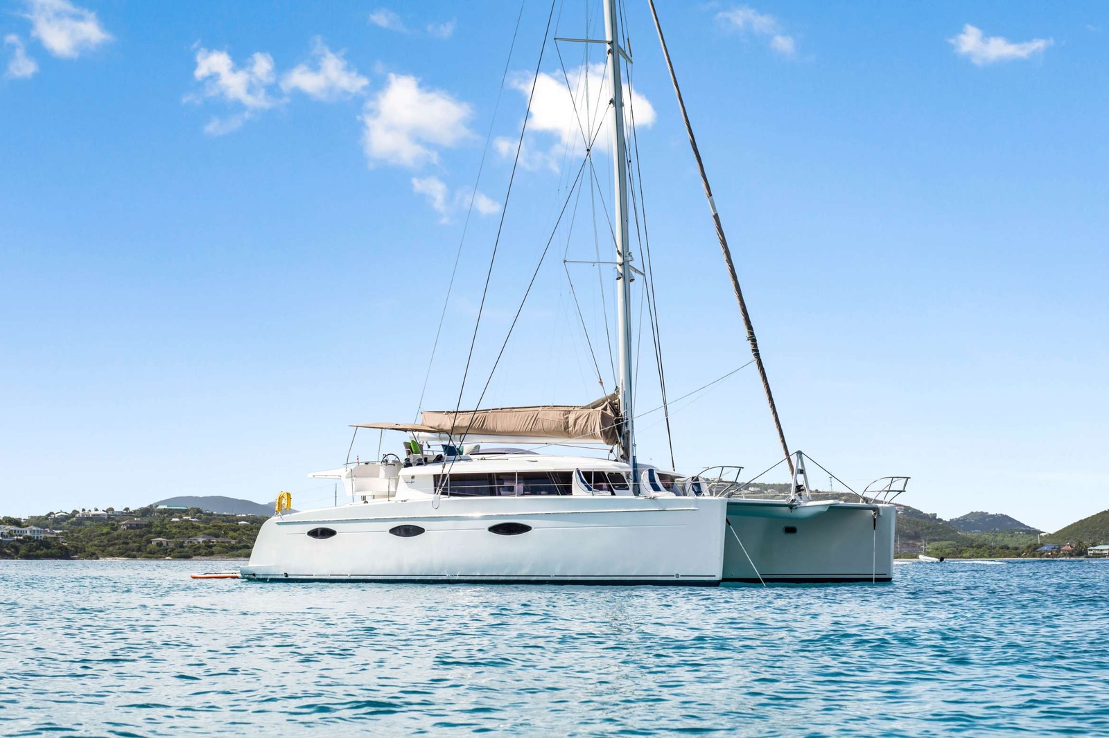 Refurbished in 2022, this 2013 59' Fountaine Pajot sailing catamaran, is truly exceptional. Perpetual Blue elevates the luxury of sailing charter yachts with her five spacious queen cabins, each featuring private ensuite baths, electric heads, vanity, and separate showers. Both the cabins and common areas of the yacht are well-lit and ventilated, complemented by custom full air-conditioning. The salon comfortably accommodates all guests for lounging or dining, while the exterior provides a memorable alfresco dining experience. The yacht features unique top deck seating and a villa-style aft lounge area, offering numerous lounging spaces for group gatherings or secluded relaxation, allowing one to fully absorb the Caribbean atmosphere on her charters.

TOYS: 2 Stand Up Paddle Boards, Snorkeling Gear, 1 2-Person Kayak, Sea Scooters, Floats & Onshore Games.