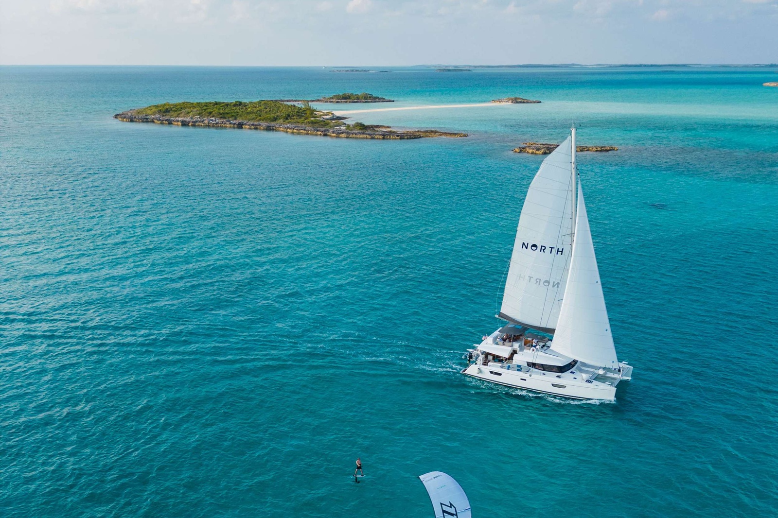 Kitesurfing in The Bahamas is a unique experience; with 700 islands and only 25 are inhabited, offering endless wild islands, white sand bars, off-shore flat water beaches, downwinders and much more. 

Join us and find the best kitesurfing spots and adventure onboard our luxury catamaran. Enjoy paddle boarding, swim with turtles, dolphins, manta rays and even swimming pigs! You can go fishing, find swells for surfing and sail between the magnificent islands, the options are endless!