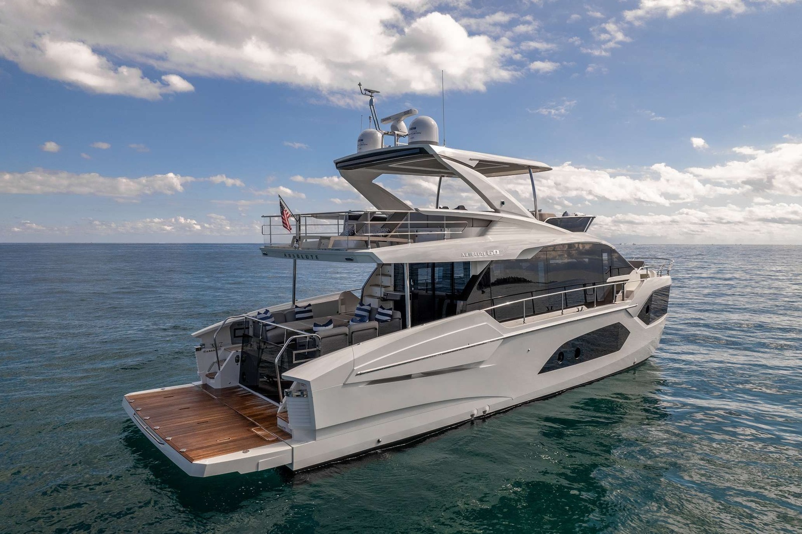 Born to reveal new and endless possibilities, the 60 FLY – The Absolute Prisma is a revolutionary model, uniquely built with a very high level of innovation for a yacht of this size. The external lines are enriched by elegant, transparent barriers which offer breathtaking views both from the flybridge and the aft cockpit. In a new progression of our cockpit design, Moreover, thanks to two convenient side stairwells, the large swim platform is easily accessed for you to enjoy right at the water’s edge. The flybridge area on the upper deck serves as a second outdoor living room ideal to sunbathe, enjoy a cocktail, and navigate while socializing. The galley, dining, and relaxation zones, offer extreme livability, elegant lines, beautiful color contrasts, and lovely finishes. The bow area is also designed for maximum versatility thanks to a sunbathing zone and a comfortable sofa with a table. This is the perfect spot to listen to music, socialize, and enjoy some privacy; all in one, day and night.