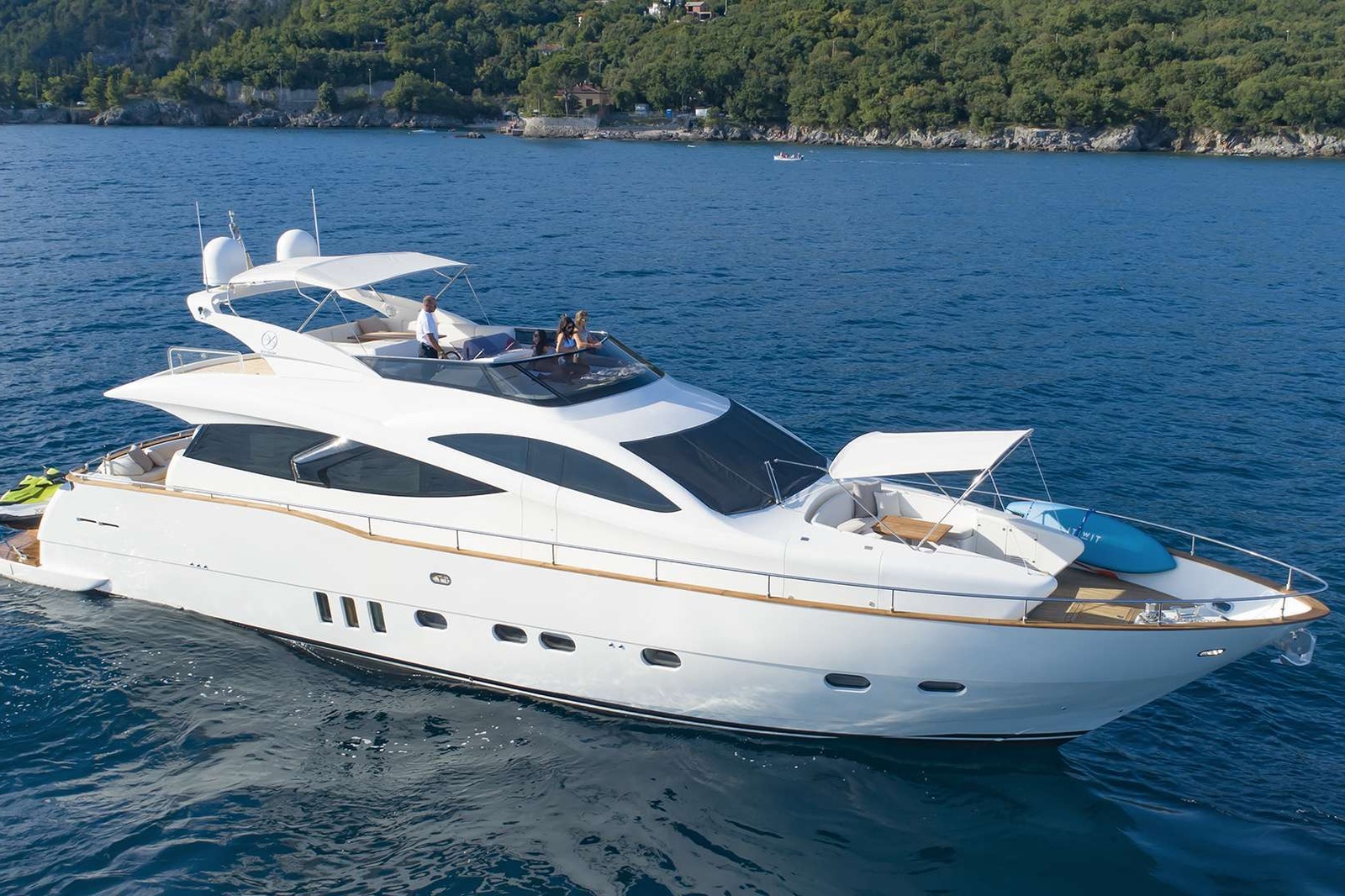 M/Y Lukas represents the perfect choice for families and friends who want to explore the Adriatic at great lengths and exciting speed. Signed by Fausto Filippetti, the co-owner of Pershing Yachts, this 23-meters-long luxury yacht was built in 2007, and completely refit in 2019. She is a head-turner: smartly designed, super-safe, very comfortable and run by an experienced crew of three, she warrants you the freedom to indulge in complete spontaneity.
Accommodating up to 8 persons in four cabins, she provides ulterior comfort while allowing for some flexibility. Two spacious cabins are doubles, and the other two are twins, but one can be converted to a double. Her common spaces invite gatherings: the flybridge features an al fresco dining table but can be converted into a large sunbathing area; the saloon has an upgraded entertainment system and the aft deck with a dining table simply calls for sunlit dinners. Hop into the turquoise Adriatic Sea from the large bathing platform with shower, and marvel at the breathtaking vistas from the lounge area on the bow, complete with a sun tent.
You’ll also enjoy a varied selection of onboard and off-board entertainment. Among the interior features, find Bang & Olufsen audio/video system, Smart TV /DVD in saloon and TVs in all cabins. Generous offer of water toys guarantees on-the-water action, ranging from the tender boat, wakeboard, water skis, and jet ski to SUP, donut, snorkeling and fishing equipment.
Onboard M/Y Lukas, options abound. Relax and enjoy the Adriatic at its best!  