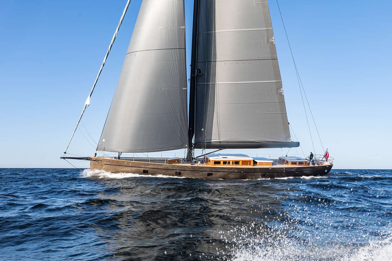 Boat International's Sailing Yacht of the Year for 2022! Built by Baltic Yachts, and delivered in 2021, this modern classic was designed by Dykstra Naval Architects. PERSEVERANCE offers exceptional sailing performance with an emphasis on green technology including smart cabins, an electric propulsion system, and the ability to regenerate electricity while underway. 

The stunning light and contemporary interior by deVosdeVries design features stained oak, dark maple flooring, and ‘industrial chic hardware’. PERSEVERANCE can accommodate up to 8 guests in 4 luxurious ensuite cabins. The spacious full beam master stateroom is located forward, with an entry foyer, king size bed, large bathroom with shower and an abundance of natural light. Amidships you will find the VIP double cabin with queen-sized bed, twin cabin, and comfortable bunk bed cabin. 

KEY FEATURES
Craftsmanship, performance, and aesthetics of a Baltic yacht
Award winning blend of style and substance
Advanced carbon fibre construction & oversized rig
Double cockpit deck layout
Bimini top over guest cockpit that can be raised or lowered while sailing 
Sleeps up to eight guests in four spacious cabins
Side boarding platform for easy access to water 
Eco-friendly systems to conserve and generate energy
Crew of talented and experienced sailors