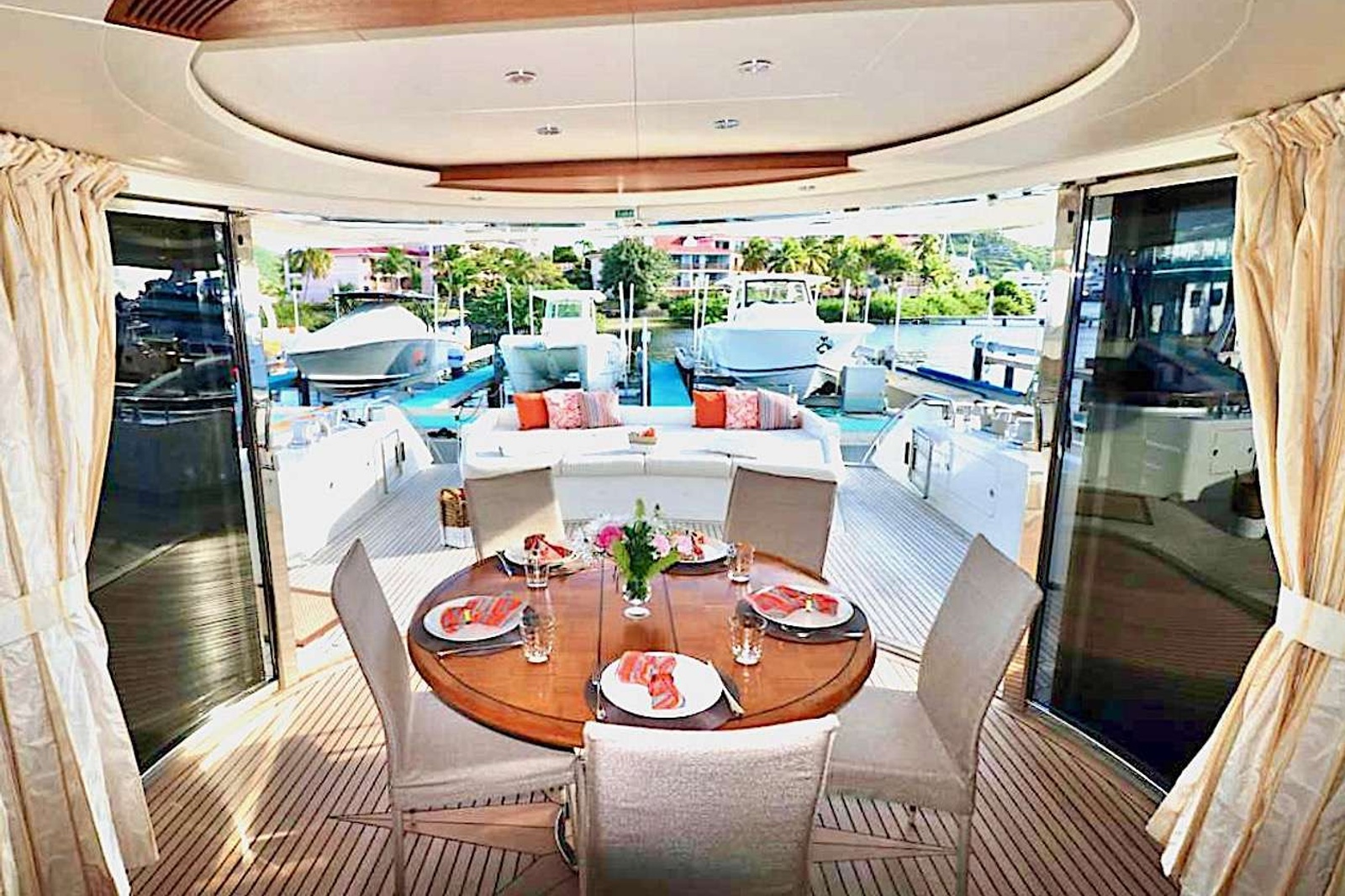 Aft deck enclosure and lounge, table leaf can be added for large groups