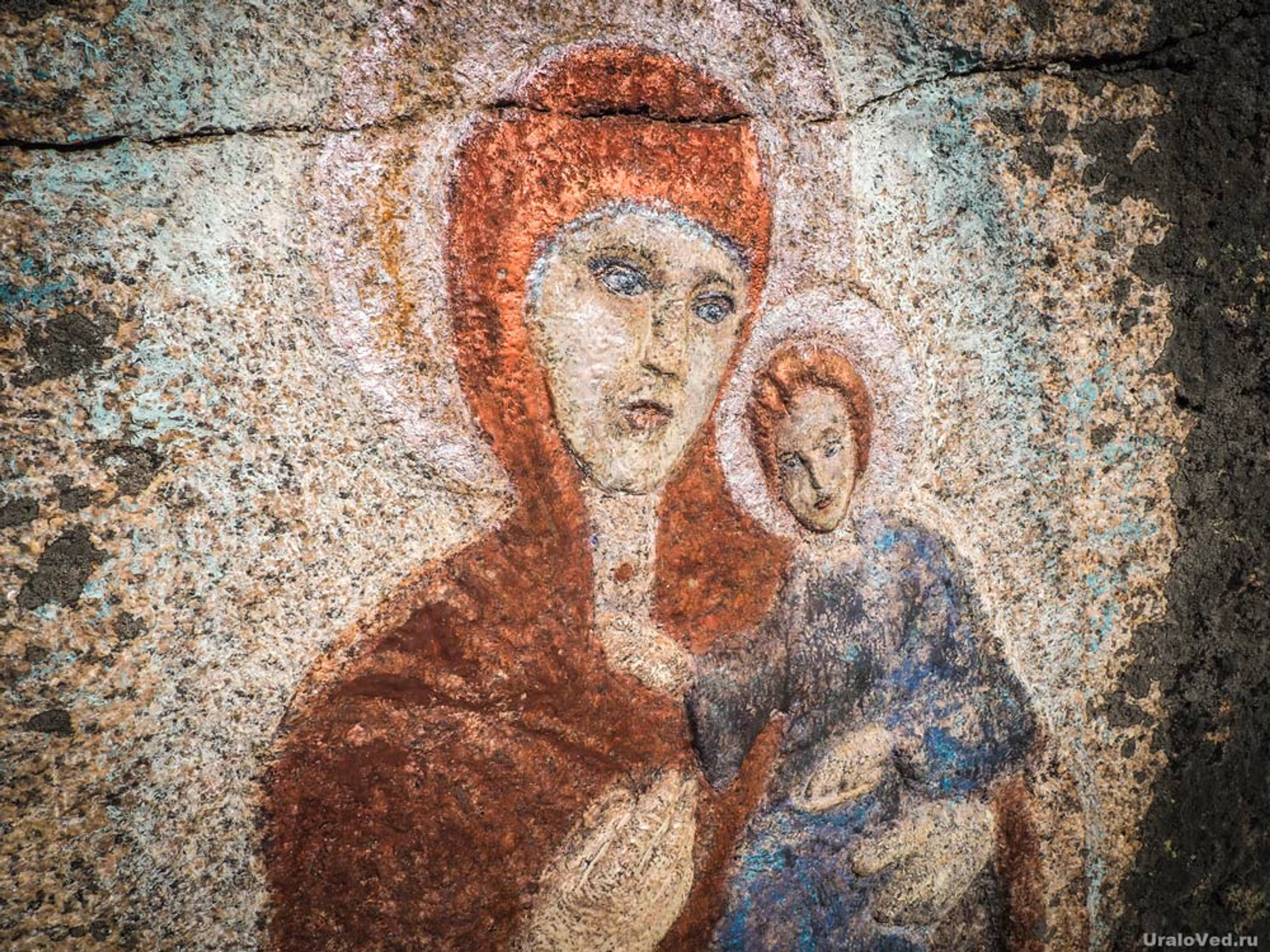 The icon of the Mother of God carved into the rock.