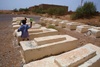 Shmuel Abu Hatzeira Cemetery, Graves With Guardian’s Daughter (Erfoud, Morocco, 2010)