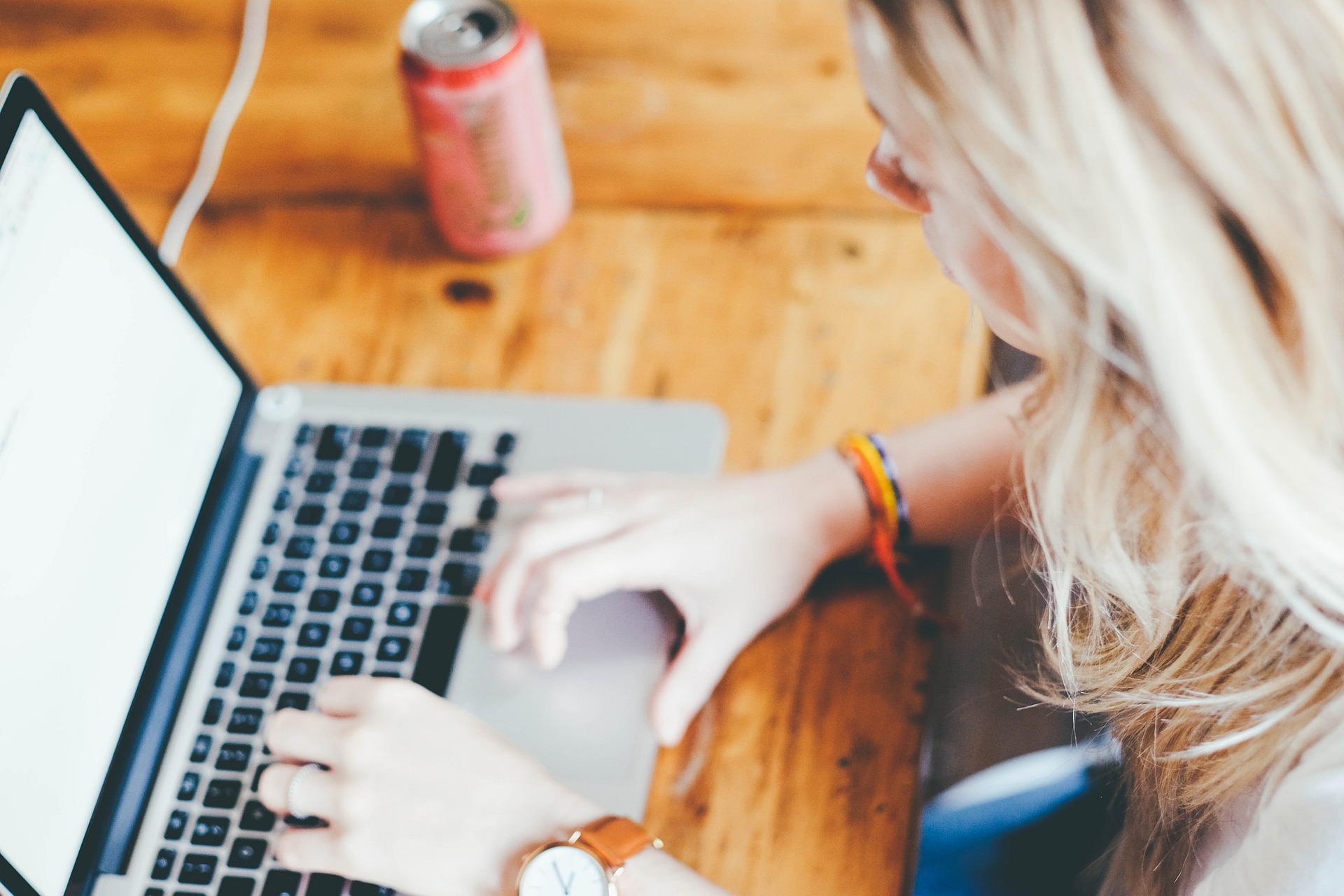 woman on her laptop looking for cyber insurance for startups