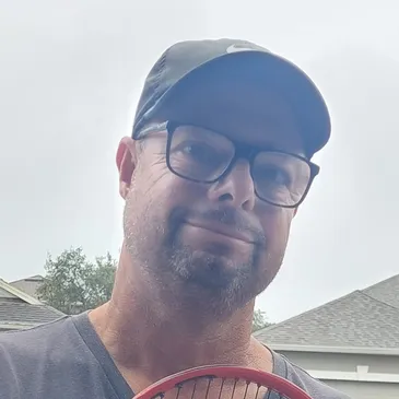 John L. teaches tennis lessons in Orlando, FL
