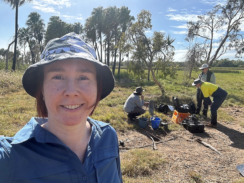 Lucy in the field with team of researchers