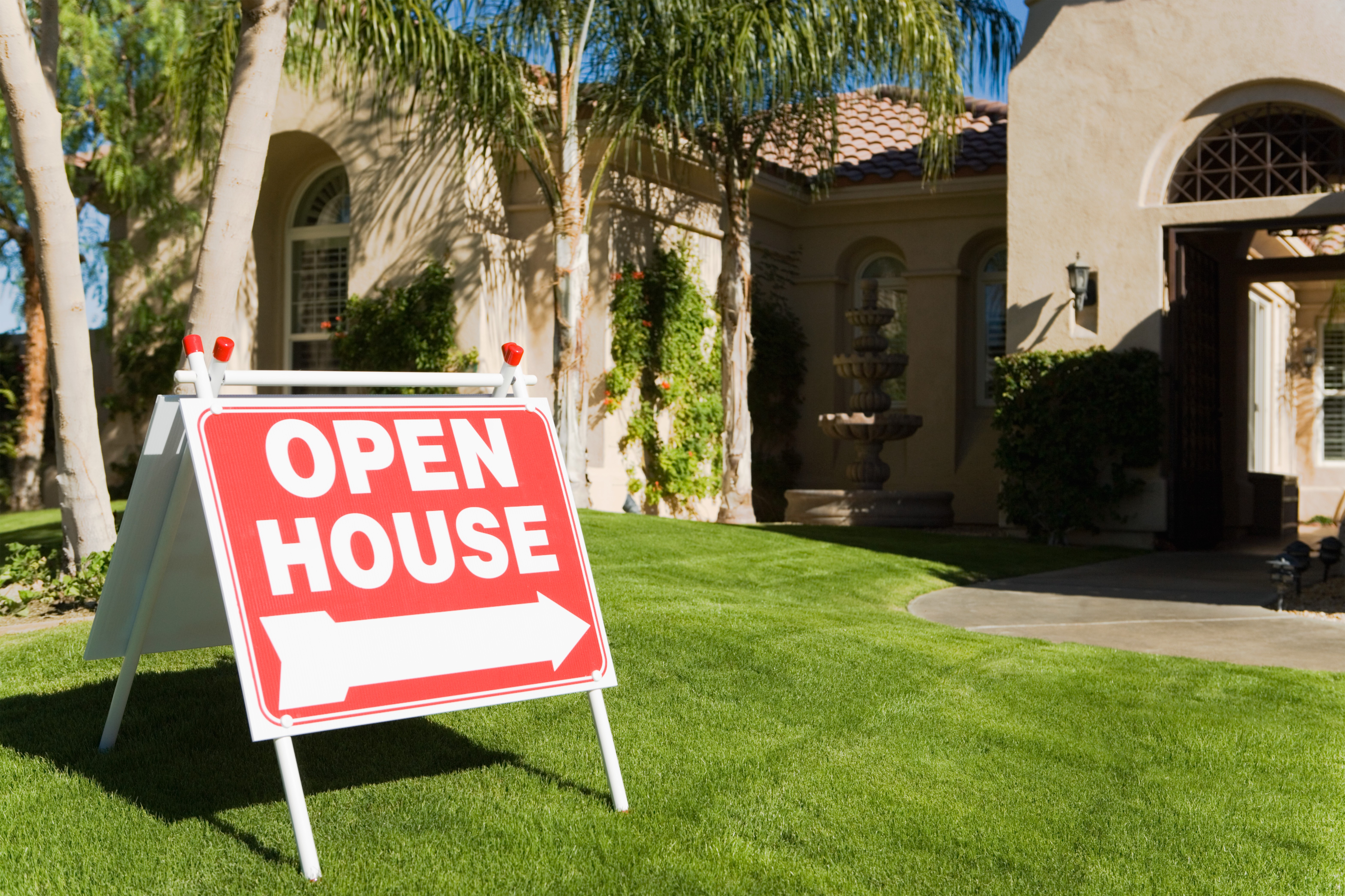 open house sign for people buying a home