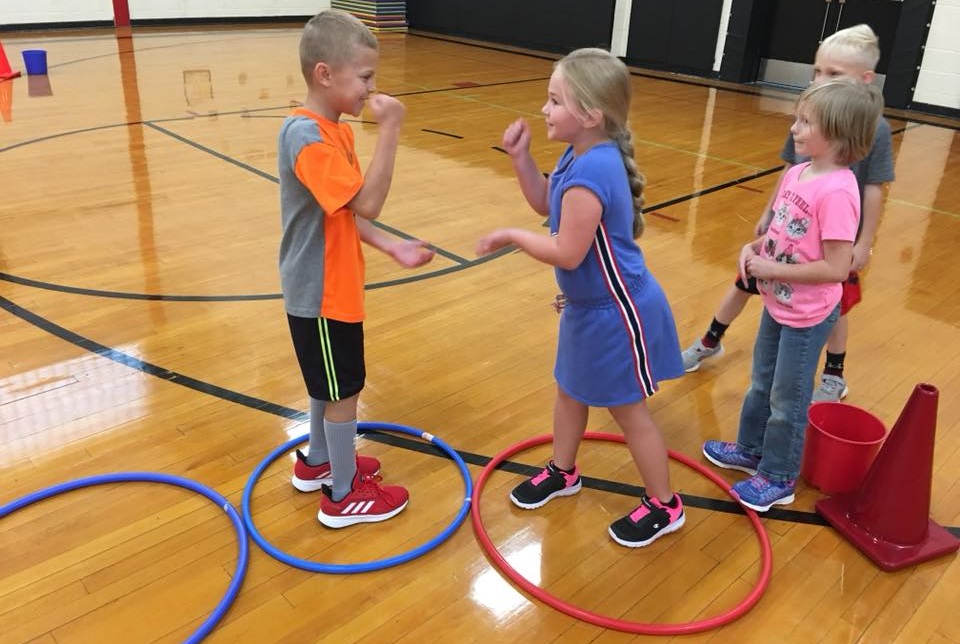 physical education games using hula hoops