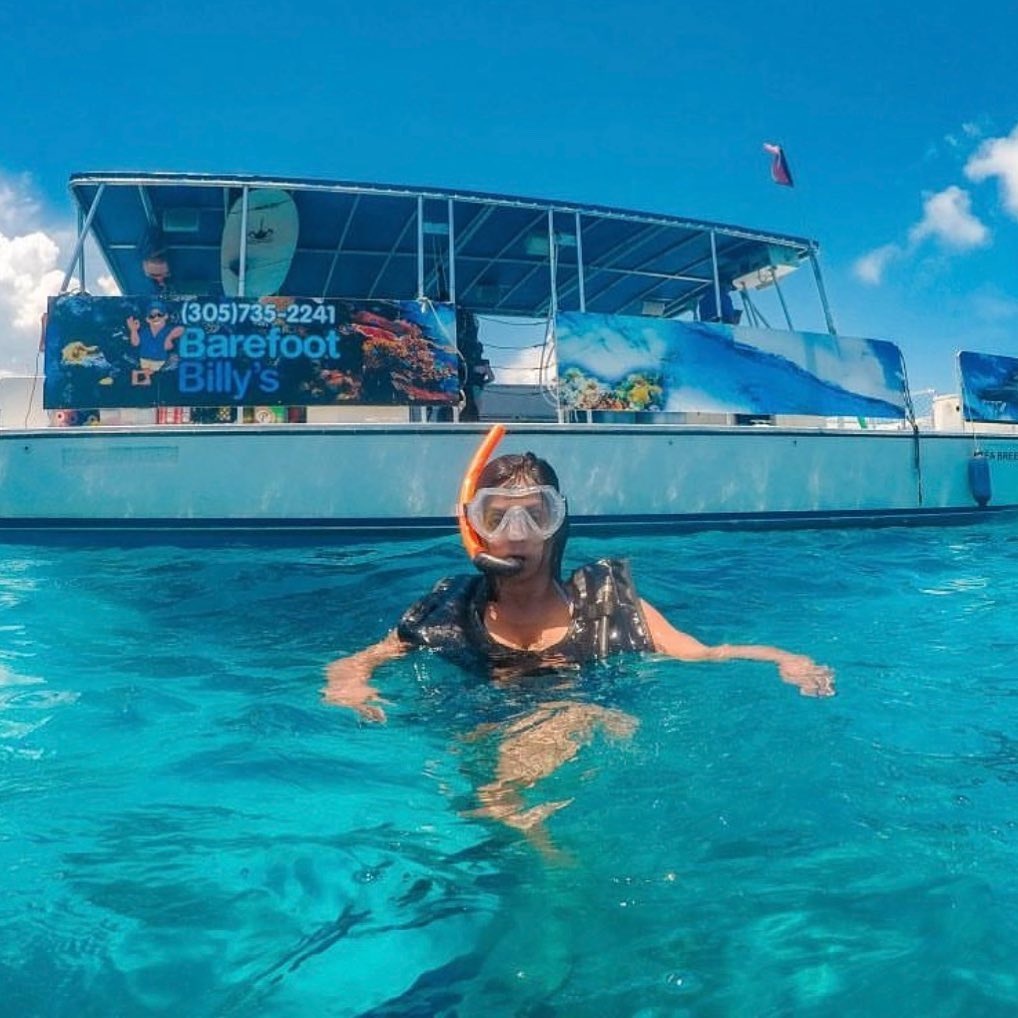 Party Boat with Dolphin & Snorkel Tour, Reefs, Complimentary Snacks, Captain and More image 1