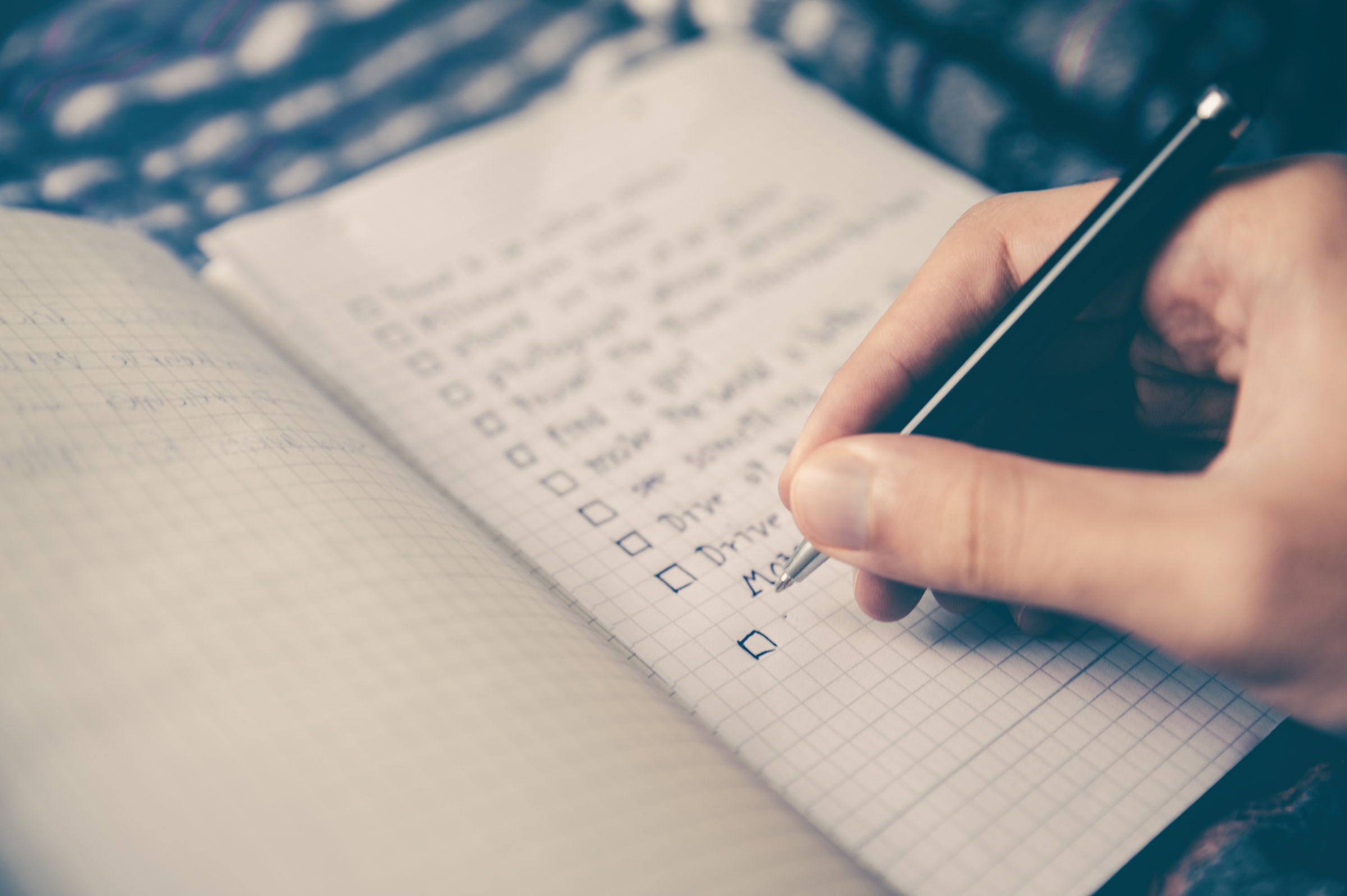 a person writes a to-do list stock image
