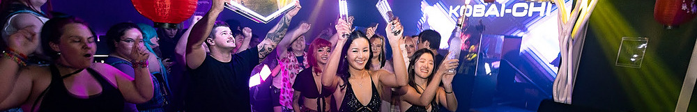 Groups of guest receiving bottle service in a nightclub.