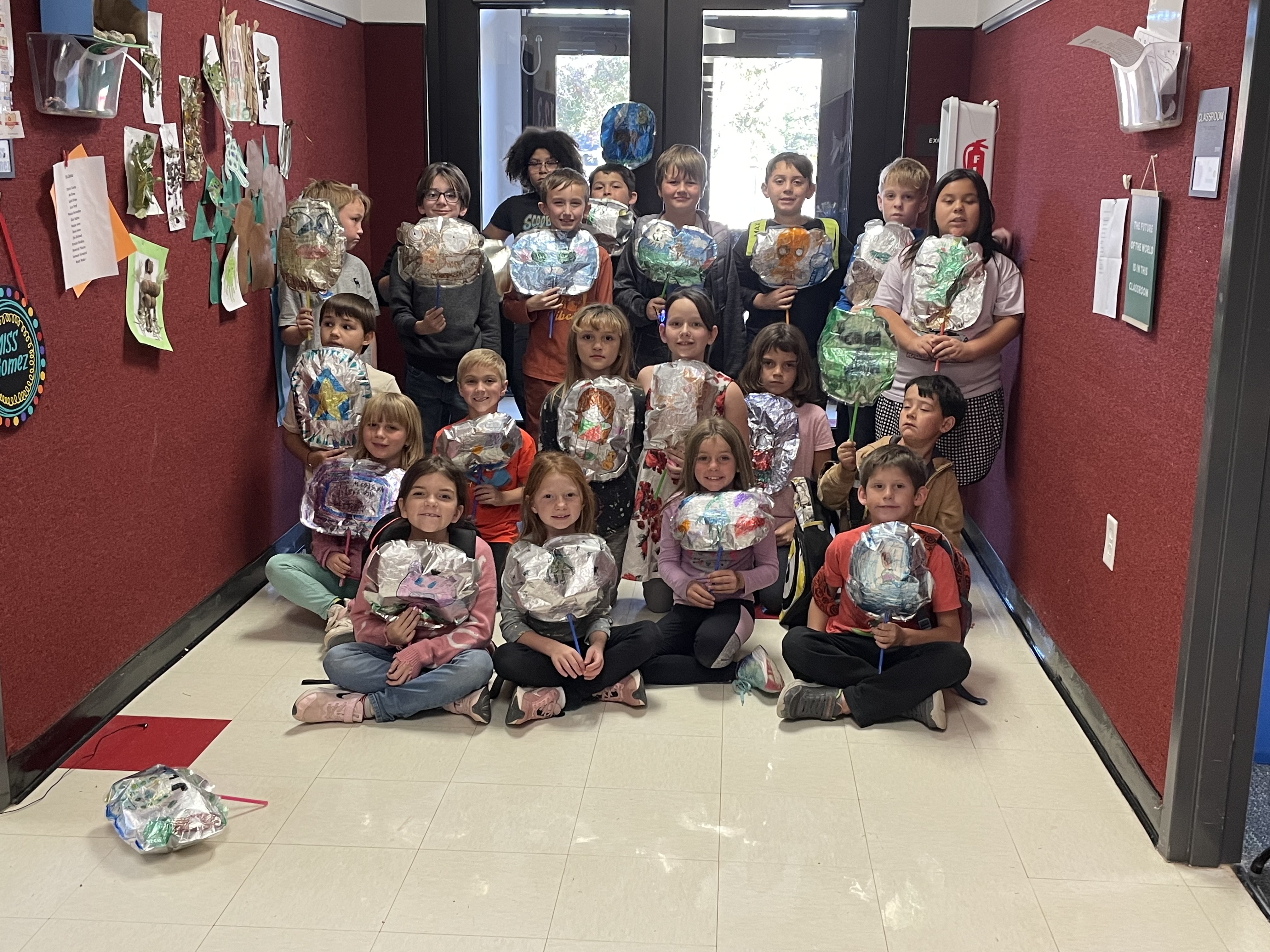 3rd graders holding their balloons