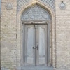 Front door to Tomb of Ezra. Hebrew writing is evident on the door.