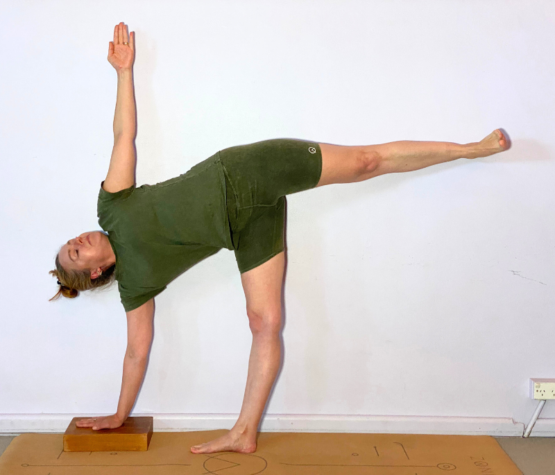 Extended Half Moon Pose with yoga block