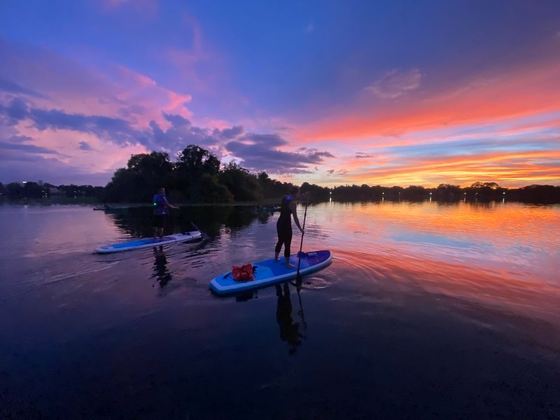 Sunset Clear Kayak or Clear Paddleboard in Paradise