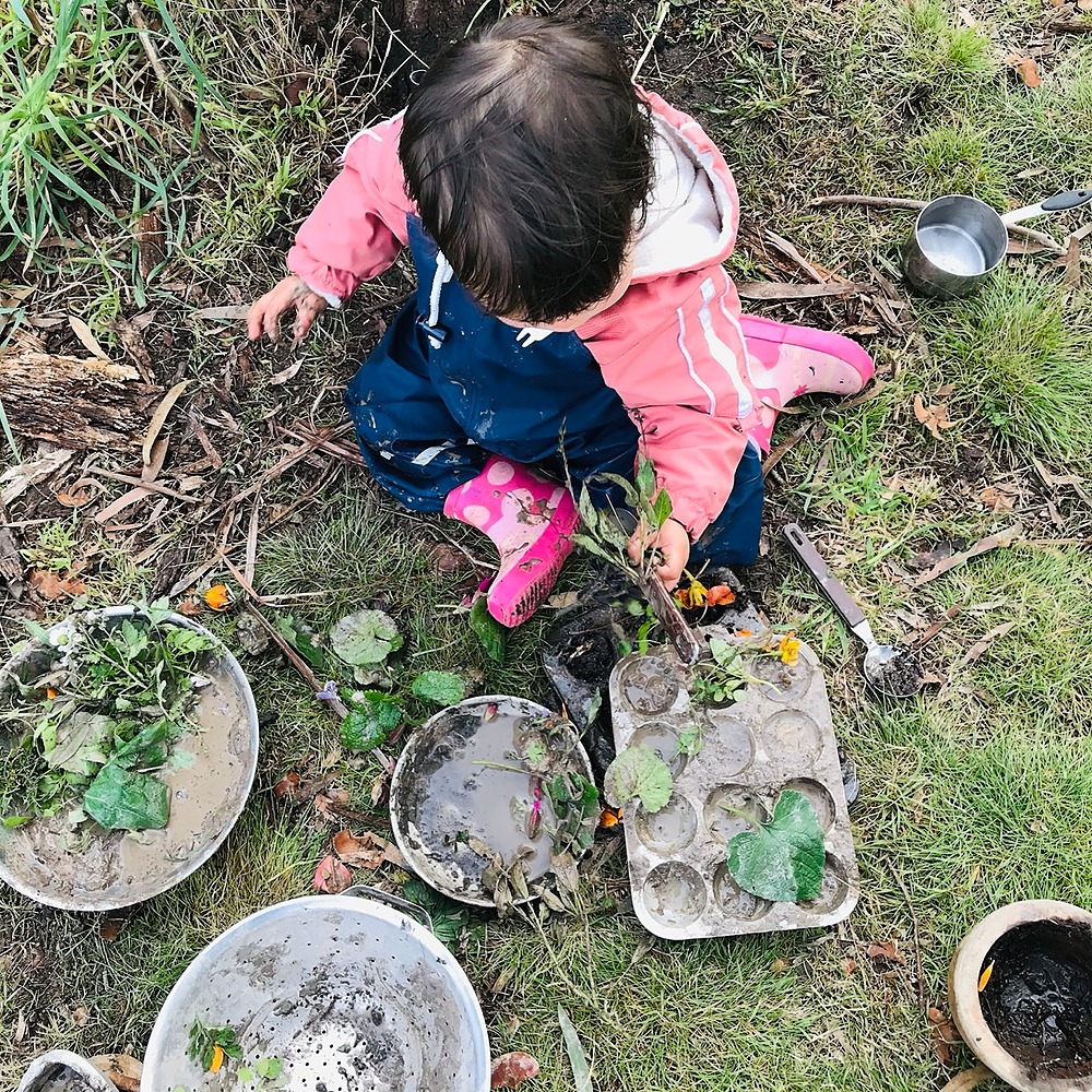 Kid Playing with Mud