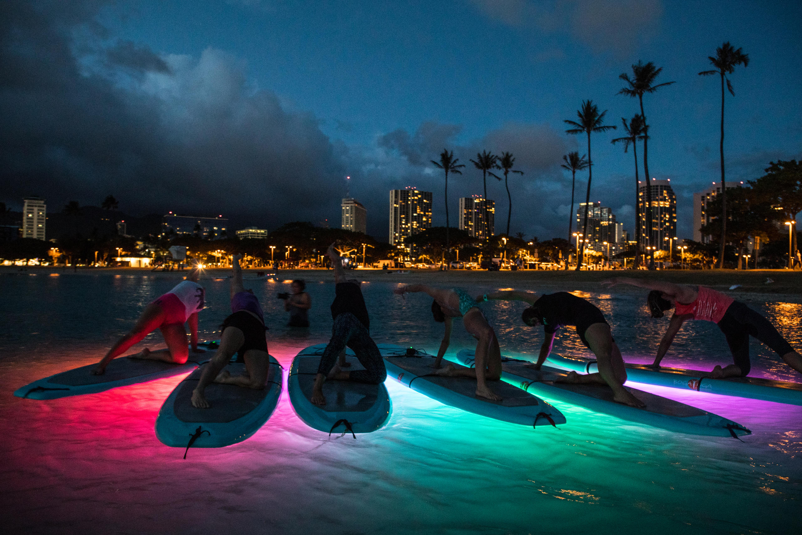 Light Up the Night Stand Up Paddle Board Yoga (Up to 8 People) image 5