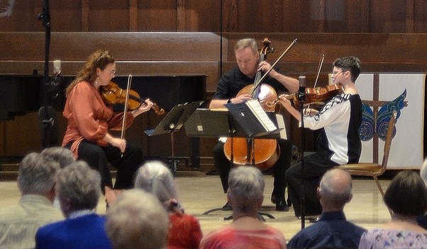 Violinist Laura Scalzo, cellist Ken Freudigman, and violist Emily Freudigman perform at Kerrville First Presbyterian Church. Photo credit Phil Houseal