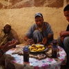 Home of Zubeda the Caretaker, Interior, Eating Lunch (Near Ighil’n’Ogho, Morocco, 2010)