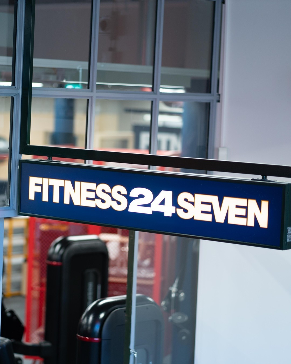 Fitness24Seven logo at gym
