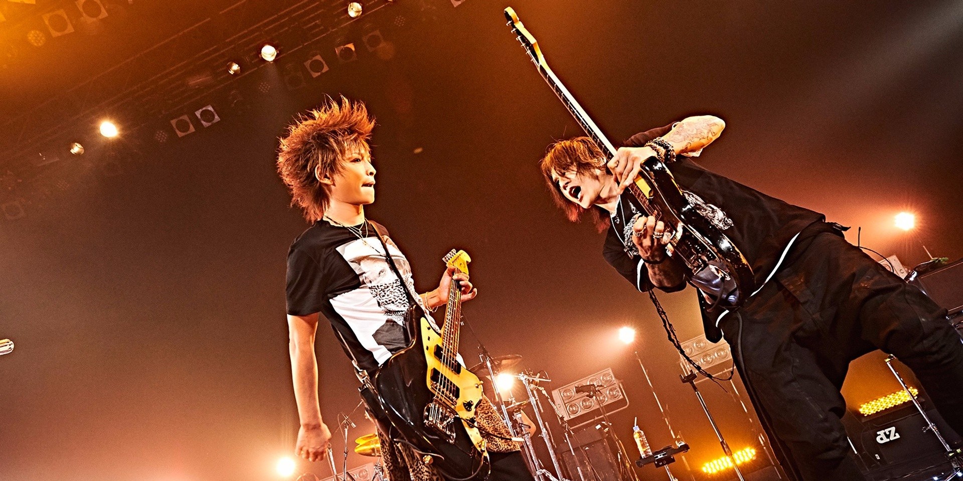 Sugizo takes on Inoran as LUNA SEA's guitar gods engage in a battle of the axes in Singapore