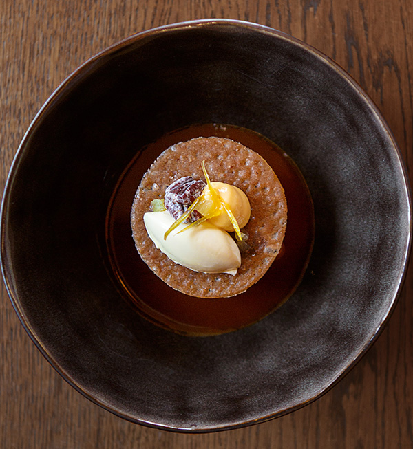 Sticky toffee with lemon, clotted cream, walnuts