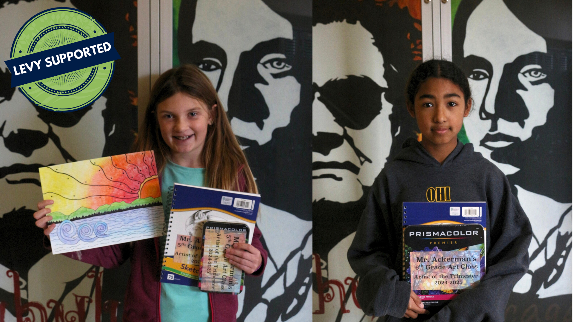 Two students stand in front of a mural, each holding artwork and an award for being Artist of the Trimester.