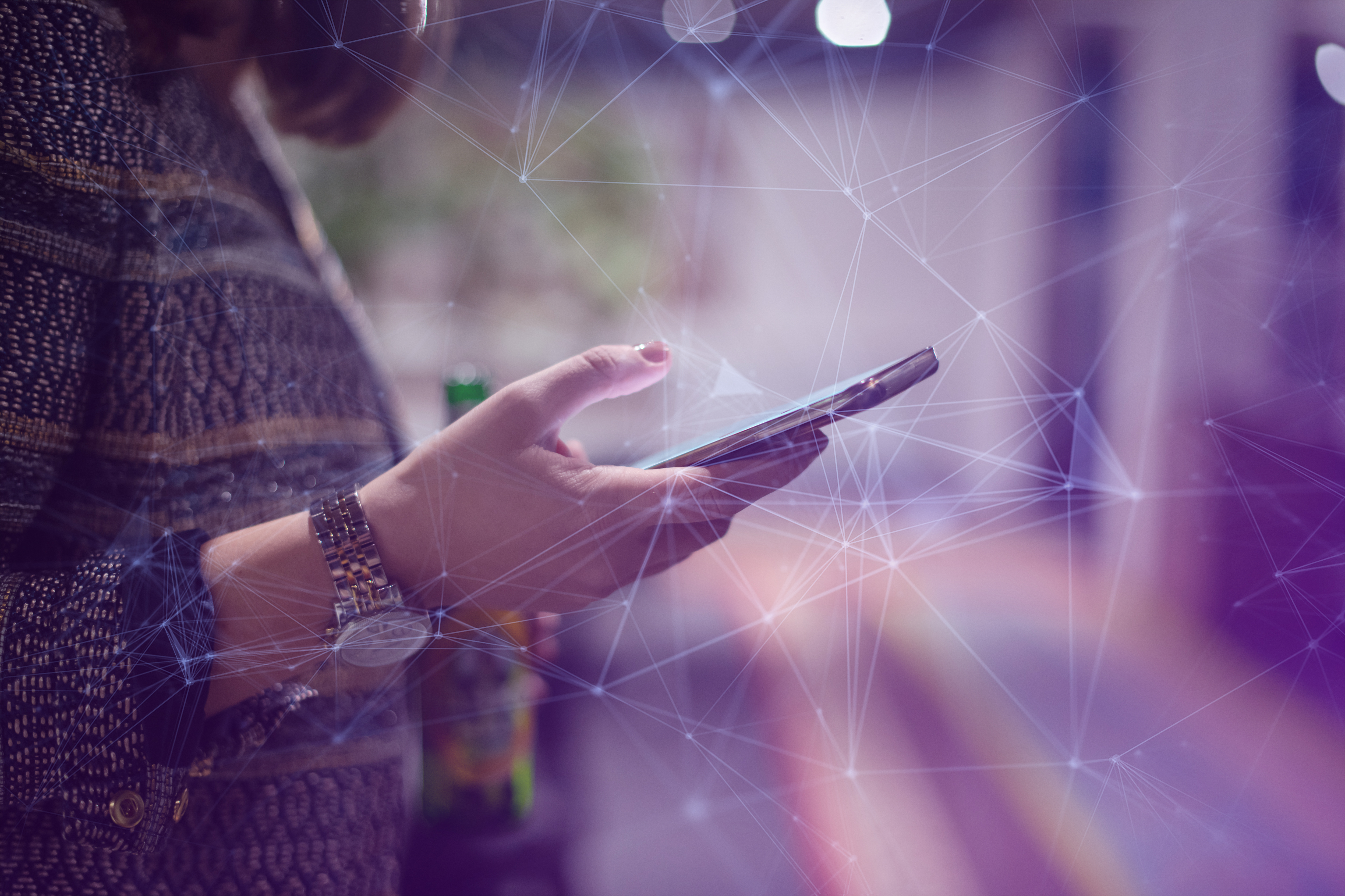 woman using a smartphone, virtual lines criss-crossing