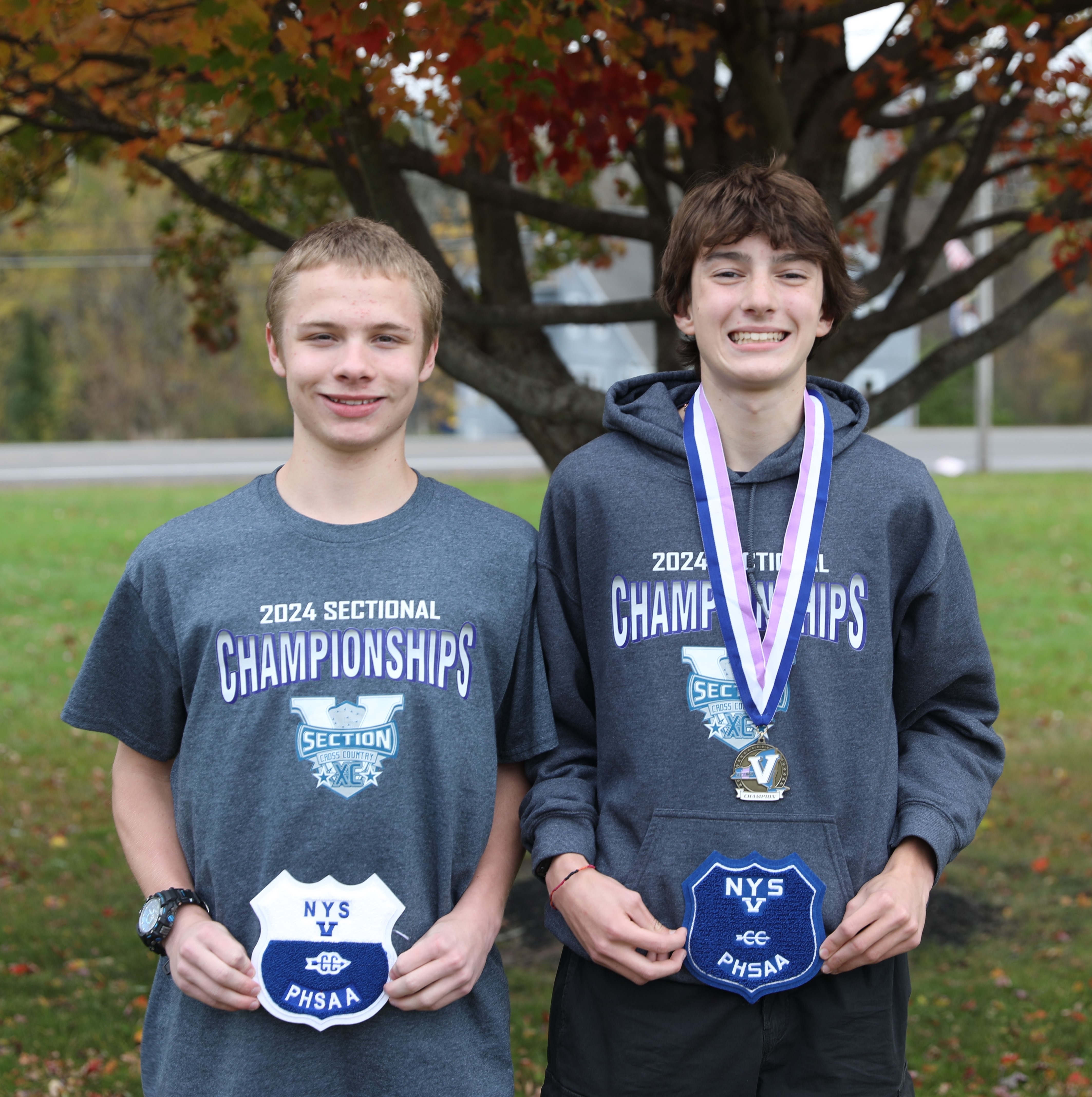 Michael Ciripompa and Aaron Meyer pose with their Section V shields 