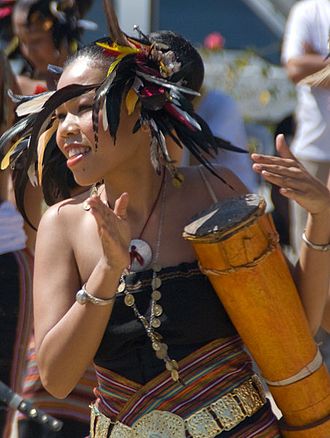 Timorese dancer playing babadok