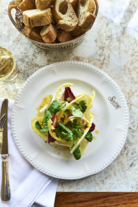 Goats' curd with endive, dandelion and mache salad