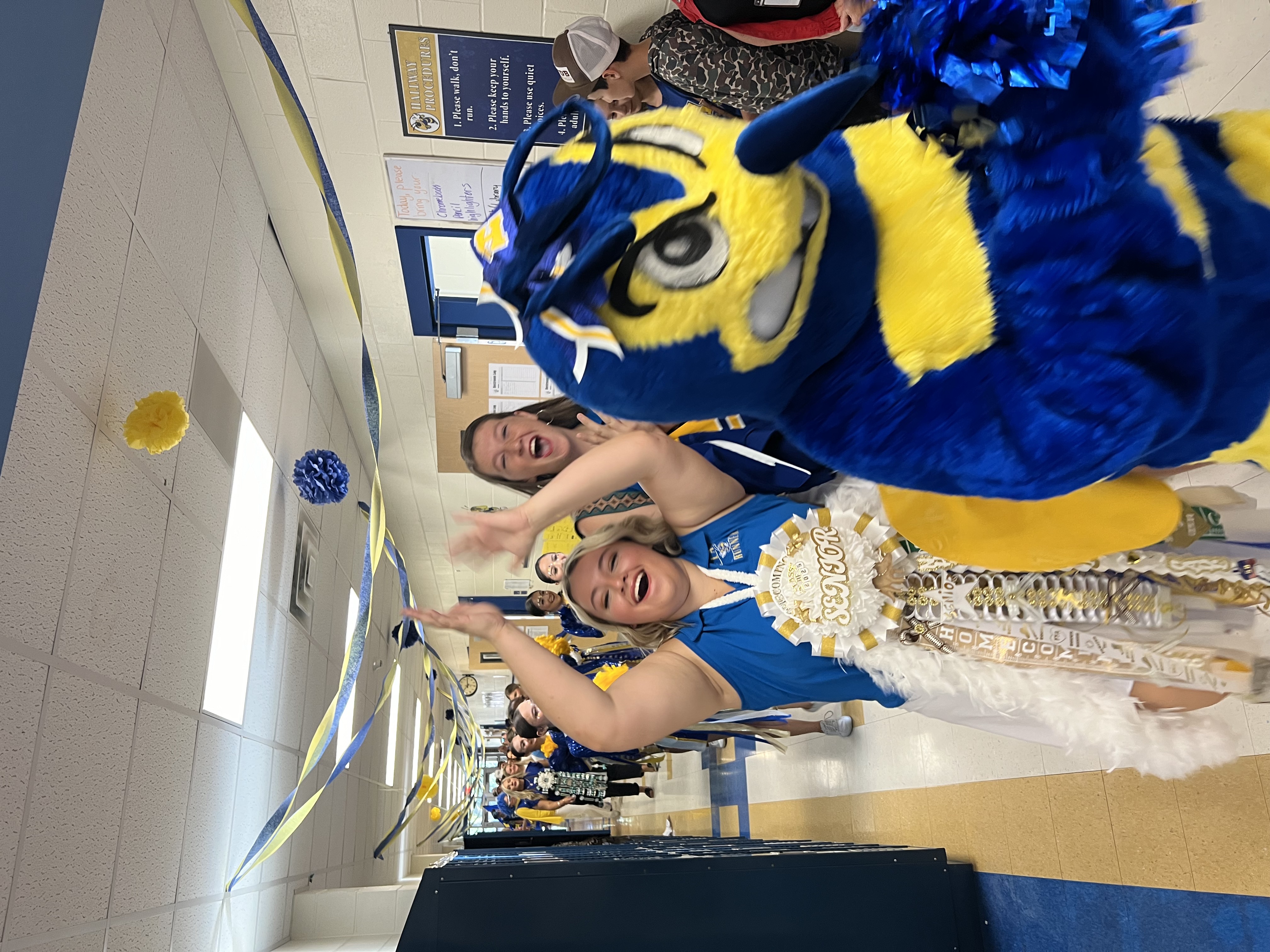 Students cheering with Hornet mascot