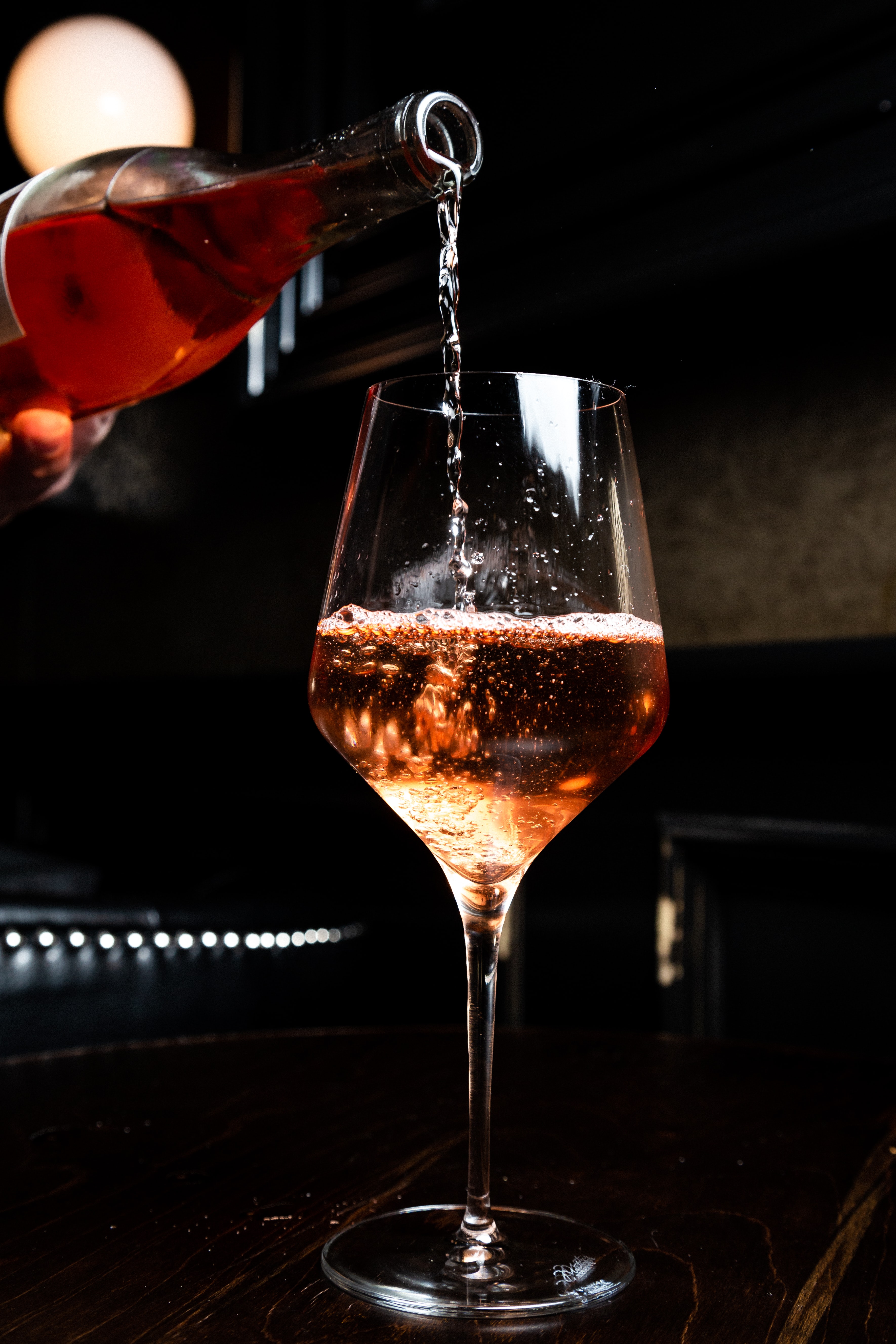 Wine pouring into a glass