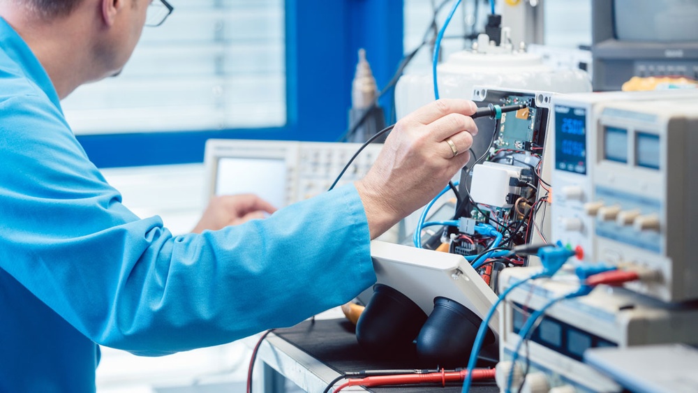 An engineer performing equipment maintenance.