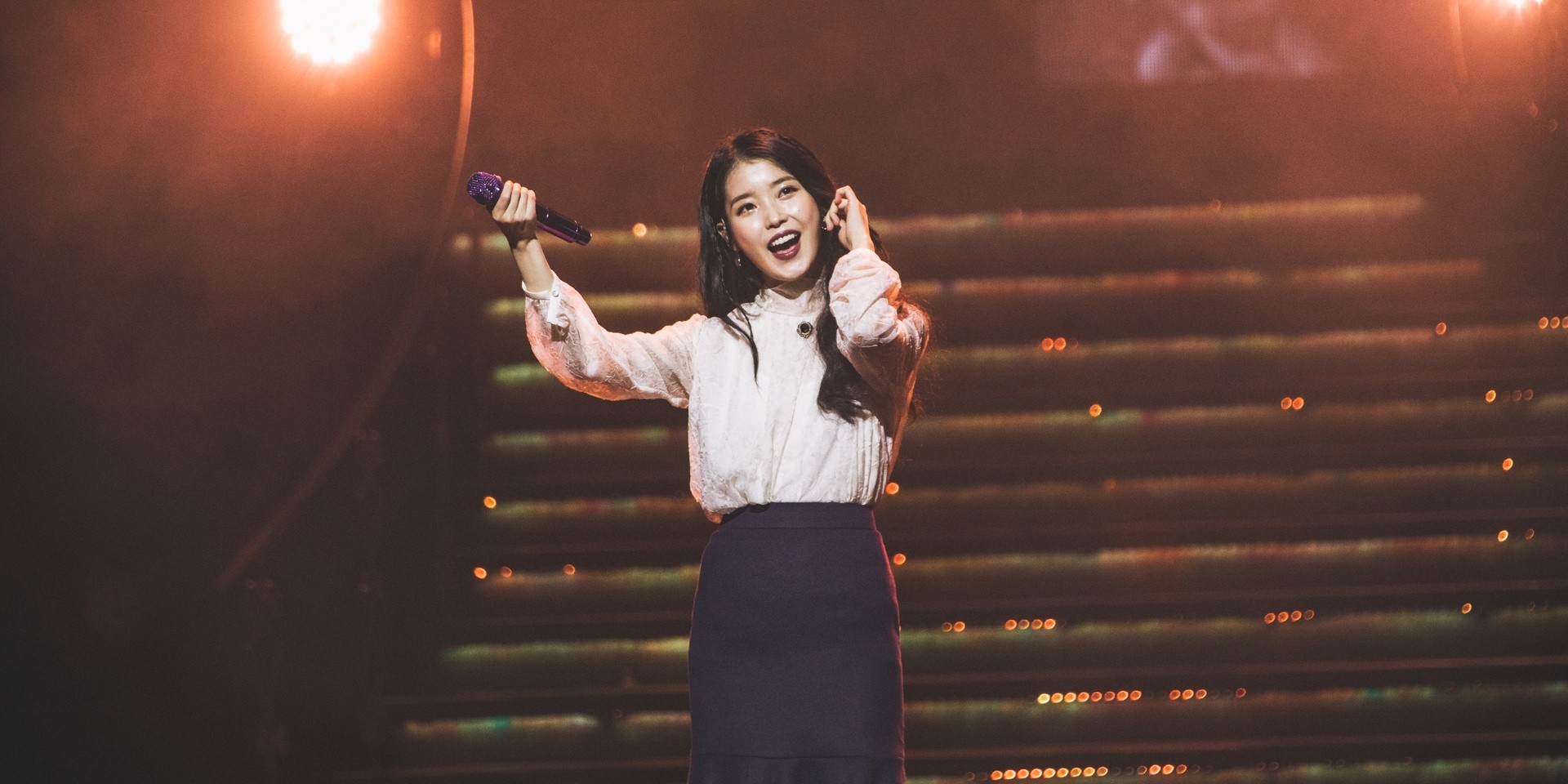 IU charms at her debut Singapore show — gig report