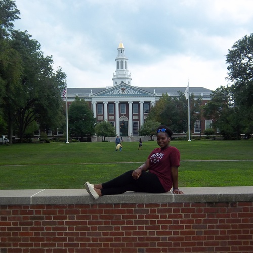 Pictures in front of the Harvard Business School. 