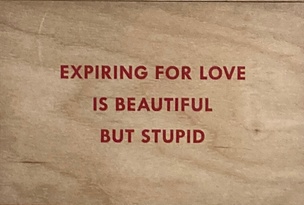 Expiring for Love is Beautiful But Stupid Wooden Postcard [Red Text]