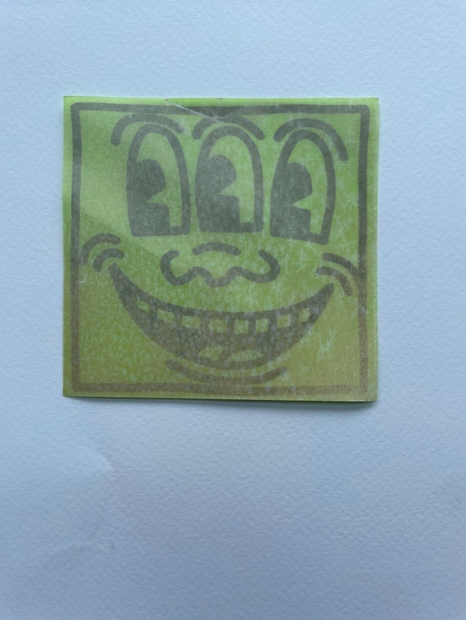 Keith Haring Pop Shop Sticker: 3 Eyed Smiling Face